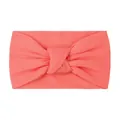 Close-up of coral pink knotted baby headband made of soft high-elastic fabric - Watermelon red