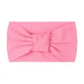 Detail showing the fabric texture and central knot design of the pink baby headband - Pink