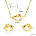 Ensemble de bijoux en acier doré avec pendentif nœud et boucles d'oreilles, détails - Style de Nœud (SE267901G)
