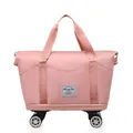 Sac de voyage rose grande capacité avec 4 roues pivotantes et tissu imperméable - Rose
