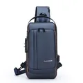 Sac bandoulière bleu foncé avec cuir bronze, serrure antivol et port de charge USB - Bleu (Fermeture Éclair Verticale)