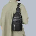 Men's black PU leather sling bag with multi-zipper compartments and textured finish - Black (5801)