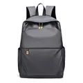 Zaino porta PC grigio scuro ad alta capacità con tessuto impermeabile e zip arancioni - grigio scuro