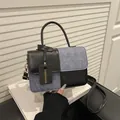 Minimalist black leather and blue denim colorblock crossbody bag with gold hardware - Black