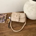 Detail of light khaki suede crossbody bag with large golden buckle and baseball charm - With Pendant / Khaki