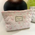 Borsa da trucco a righe in tela con trapuntatura a cuore e fiocchi rosa - Stile a righe rosa