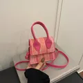 Mini borsa a tracolla intrecciata rosa e arancione con dettagli oro e manico superiore - Rosa