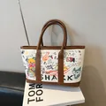 Sac seau graffiti avec motifs ours de dessin animé et garniture en cuir marron - Marron