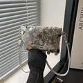 Detail of silver sequin shoulder bag with large reflective scales and gold metal buckle - Silver