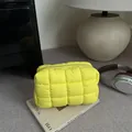 Bright yellow quilted nylon handbag with square stitching and top zipper closure - Yellow