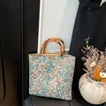Floral canvas tote bag with natural bamboo handles in a vintage pastoral style - Blue Flower