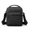 Men's black Oxford fabric crossbody shoulder bag with dual zipper pockets and top handle - Black