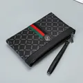 Men's dark grey envelope clutch bag with rhombic texture and metal lion head logo - Black