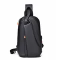 Waterproof black crossbody chest bag for men with adjustable strap and orange zipper detail - Black