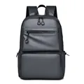 Minimalist business laptop backpack in charcoal grey with waterproof matte fabric finish - Gray