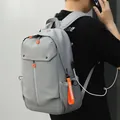 Zaino grigio con cerniere arancioni e porta di ricarica USB esterna integrata - Grigio