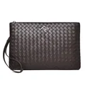 Dark brown woven clutch bag with a metallic kangaroo logo and a matching wrist strap - Brown