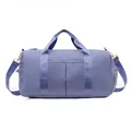 Detailed view of the dry-wet separation travel bag with adjustable strap and dual handles - Gray Blue