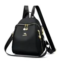 Zaino classico nero in tessuto oxford da donna con dettagli in metallo dorato e zip - Piccolo / Nero