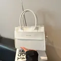 Chic white crocodile embossed tote bag with dual handles and detachable shoulder strap - White