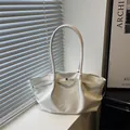 Minimalist white glossy oil wax leather tote bag with elegant drawstring detail - White