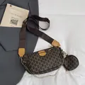 Dark brown shoulder bag with M-pattern print, wide fabric strap and small round purse - Brown