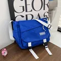 Klein blue nylon messenger bag with white adjustable strap and fashion label - Blue