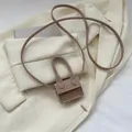 Brown micro crossbody bag in matte suede with large curved handle and long strap - Khaki