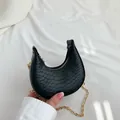 Black crescent moon shoulder bag with snake skin pattern and golden metal chain - Black