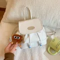 White mini PU leather backpack with cute brown plush charm and fashion logo label - With Pendant / Off-white