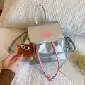 Mini silver PU leather backpack with fashion patch and brown plush doll keychain - With Pendant / Silver