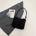 Sac seau minimaliste en daim noir avec bandoulière à nœud pour une mode féminine chic - Aspect Cuir Dépoli / Noir Mat