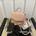Pink PU leather crossbody bag with crocodile pattern and decorative gold chain strap - Pink