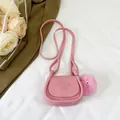 Mini pink saddle bag for kids in faux leather featuring cartoon embossed detail - Pink