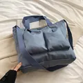 Grijsblauwe nylon crossbody tas met meerdere zakken en brede geweven riem voor dames - Blauw