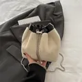 Plush cream white bucket bag with silver chain and pearl drawstring details - White