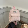 Mini sac à dos rose en tissu froissé avec décoration de nœud en métal argenté - Rose