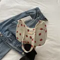 Retro cream corduroy crescent bag with red strawberry print and golden metal plate - Corduroy / Strawberry Print Style / White
