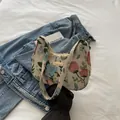 Vintage floral jacquard crescent bag with colorful floral patterns and gold buckle - Jacquard / Jacquard Floral Style / Light Floral