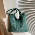 Green corduroy tote bag with white embroidery and minimalist vintage shoulder design - Dark Green