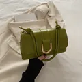 Matcha green rectangular leather handbag with gold U-shaped buckle and knotted strap - Green