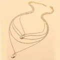 Collar de capas dorado con colgantes geométricos de corazón y concha con cadena de metal - Estilo Concha Multicapa (WXL656)