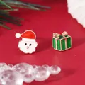 Detail of asymmetric Christmas earrings featuring Santa Claus and a green gift box with rhinestones - Asymmetric Santa Box (WEH068-6)