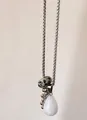 Detail of teardrop stone pendant with Dalmatian Jasper bead on long square link chain - White Crystal Pendant Necklace