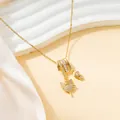 Gold fairy and astronaut pendant necklace with sparkling crystal accents for women - Gold