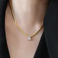 Elegant gold-tone snake chain necklace with a pear-cut zircon pendant on model - 40cm+5cm / Gold Zirconia Drop