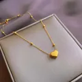 Elegant gold heart pendant necklace with beaded chain on a luxury gift jewelry box - Heart Style (x1208) / Gold