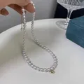 Elegant French vintage white pearl necklace with gold bead accent and lobster clasp - Pearl Necklace (86018)