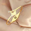 Detail of golden butterfly hinge bracelet with matte finish and small zircon accent - Frosted Butterfly Bracelet (Gold/z009)
