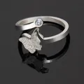 Macro shot of silver butterfly ring with micro-pave crystals and single round diamond - Frosted Butterfly Zirconia Open Ring (Silver/D001)